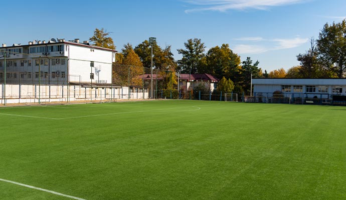 A large outdoor field with artificial turf