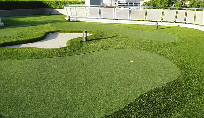 Rooftop golf field with artificial turf