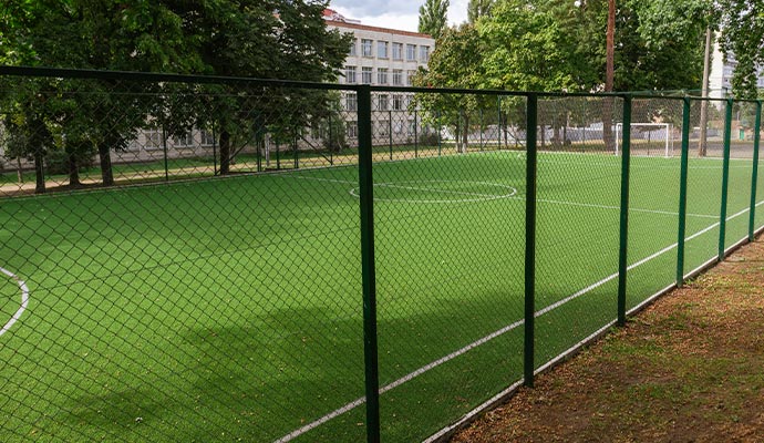 Sports field with artificial turf