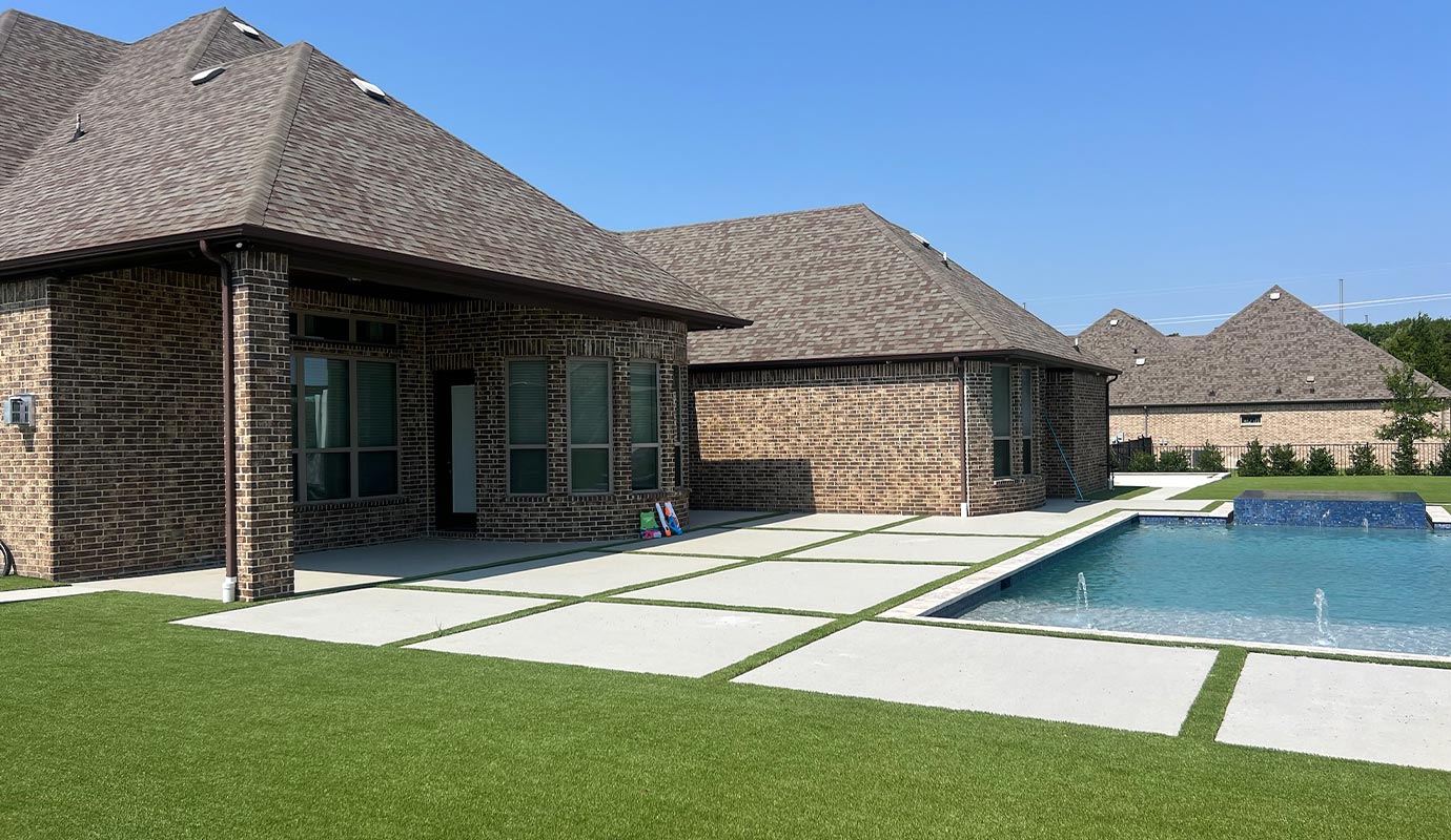 Modern residential backyard with artificial turf