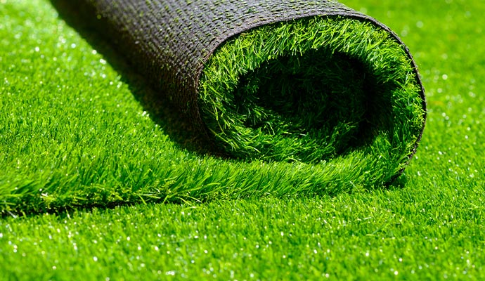 A close-up view of a rolled artificial grass