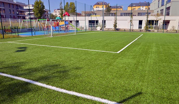 Sports field with artificial grass