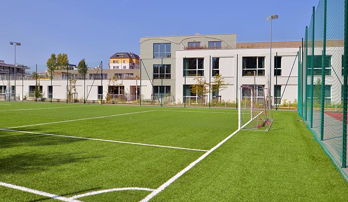 Sports field with artificial turf