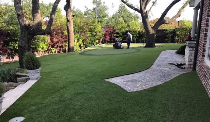 A residential outdoor space with artificial grass