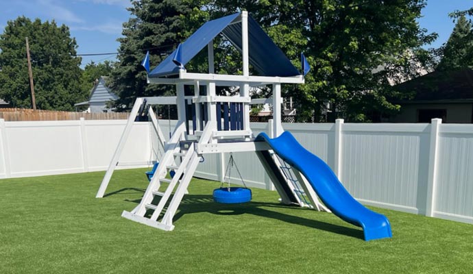 Residential playground with artificial turf