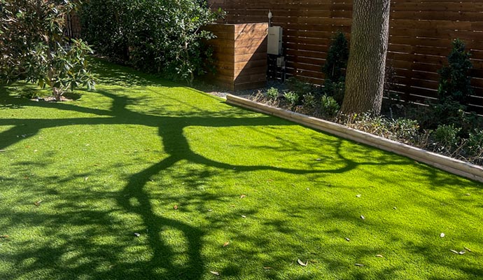 Backyard with synthetic grass
